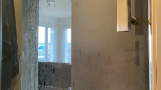 Handjob in the shower with cumshot