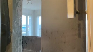 Handjob in the shower with cumshot