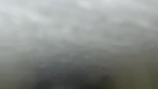 Trying to knot big black dildo