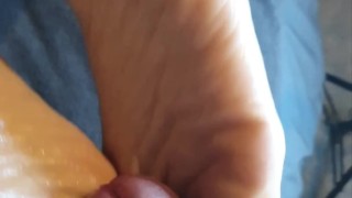 ASMR footjob with my MILF. Louise playing with my big cock with her toes and feet gripping my dick.
