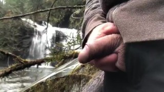 Taking A Piss Near Trent Falls on Vancouver Island Canada During A Hike