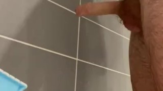 Male in the shower cum massive on the tiles !! Big cum
