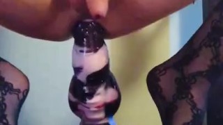 Trying to sit down on my huge Bad Dragon dildo