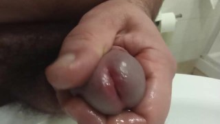 morning stron pee and foreskin play. Extreme close up.