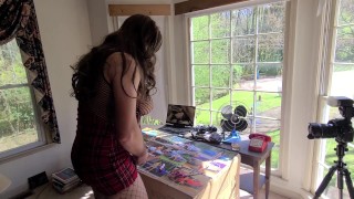 Big fake tits crossdresser doing arts and crafts in front of open window