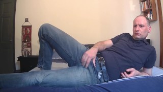 Kudoslong pulls down his jeans and underwear and masturbates his hairy penis until he is erect