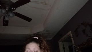 wife playing with toy and sucking
