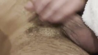 HOT Canadian athlete plays with his semi in the sauna at a crowded gym