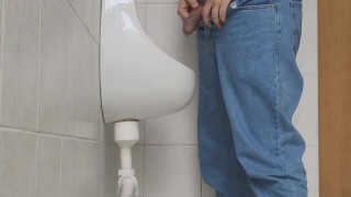 Risky jerk in public urinal at work