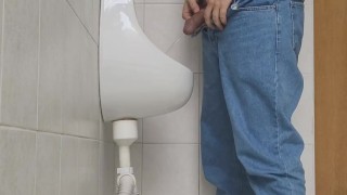 Risky jerk in public urinal at work