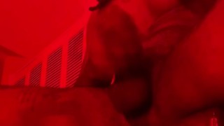 Passionately stroking my hard veiny cock under crimson lighting