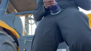 (Fleshbating near a tractor)