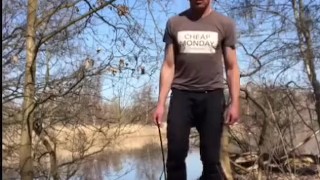 Naked Guy shooting his Cum at the Lake