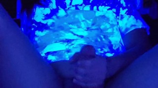 Femboy jerks off under black light