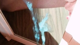 Cumming on a mirror on a sunny day POV