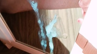 Cumming on a mirror on a sunny day POV