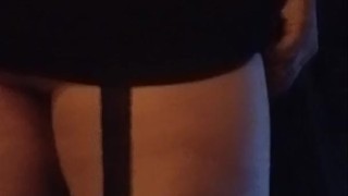 Crossdressing locked in chastity with buttplug in