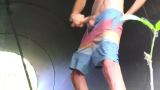 Public stroking monster cock in a culvert huge load