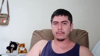 Handsome guy playing with cock and cum