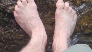 Barefoot walk through the woods. Solo male feet preview