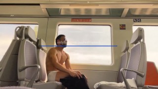 Hot muscle man travelling fully naked on a train to Barcelona. Very risky
