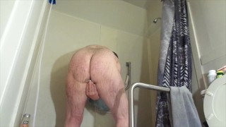 A self enema with extra play in the shower