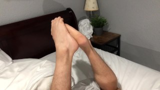 pornstar Dillon Roman plays with feet