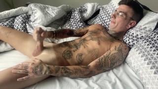 Hot tattooed guy shots own cum into mouth