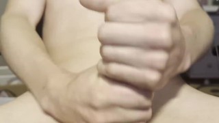 Young Stud wanks off big hard cock