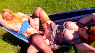 Red XXX and Lucy Gresty enjoy a picnic outdoors
