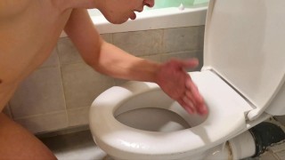 Sissy stupid femboy cleans the toilet after daddy pissed it over