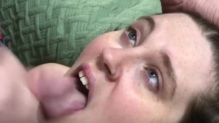 MASSIVE CUMSHOT IN SEXY BRUNETTE’S BLUE EYES AND FRECKLED FACE