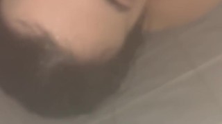 HORNY TATTOOED BRUNETTE SUCKS COCK AND SWALLOWS CUM IN THE SHOWER