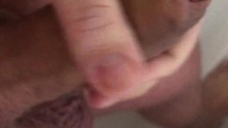 Lad shows off his big cock in the shower