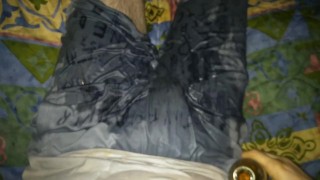 emptying bottle of piss on under armour clothes