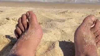 big feet on the sand