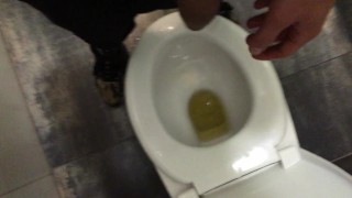 Fat cock with fat balls pissing at the shopping mall