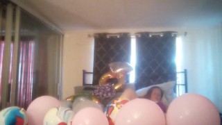 Milf with extreme long hair popping balloons and smoking cigarettes while filming up her own skirt