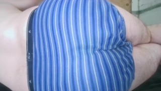 Laying on my side in my striped underwear