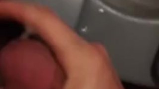 Cumming in airplane bathroom while flying