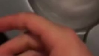 Cumming in airplane bathroom while flying