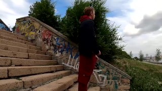 handsome guy masturbates his big dick on the embankment in extreme