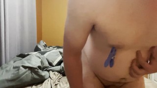 Jerking off with nipple torture