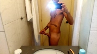 Middle eastern guy jerks off in hotel bathroom, cums in sink