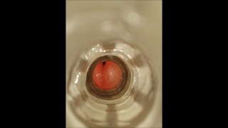 Extreme close-up of the inside of a fleshlight whilst I fuck it and cum inside it.