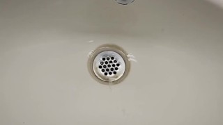 Messy piss onto the sink