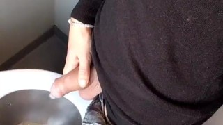 Piss with low hanging balls on the train toilet