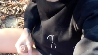 Huge cumshot on black shirt in the park