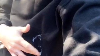 Huge cumshot on black shirt in the park