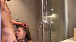 Petite hottie deepthroats in the shower before she gets fucked